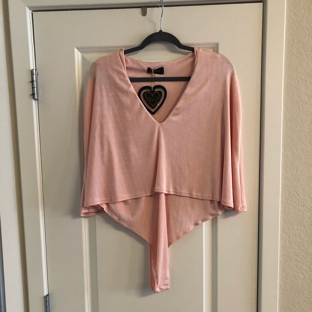 Blush bodysuit with shelf overlay